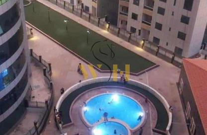 Apartment - 1 Bedroom - 2 Bathrooms for sale in Orient Tower 2 - Orient Towers - Al Bustan - Ajman
