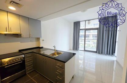 Apartment - Studio - 1 Bathroom for rent in Golf Panorama B - Golf Panorama - Golf Town - Damac Hills - Dubai