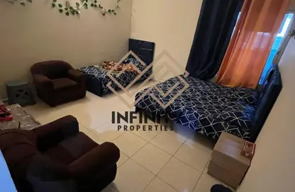 شقة - غرفة نوم - 2 حمامات للبيع في أورينت تاور 1 - أورينت تاور - البستان - عجمان