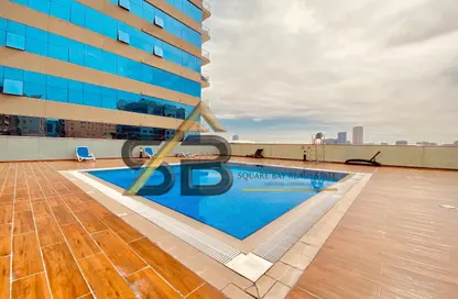 Apartment - Studio - 1 Bathroom for rent in Silicon Gates 4 - Silicon Gates - Dubai Silicon Oasis - Dubai