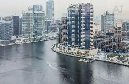 Apartment - 4 Bedrooms - 5 Bathrooms for sale in Jumeirah Living Business Bay - Peninsula - Business Bay - Dubai