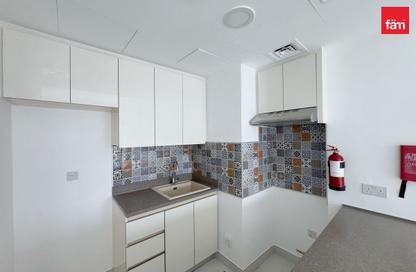 Apartment - 1 - 2 for rent in Rabdan Building - Motor City - Dubai
