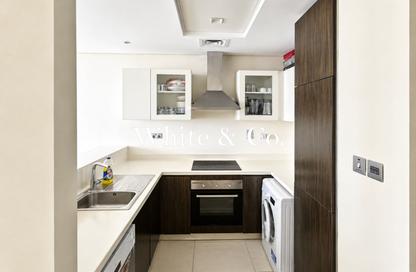 Apartment - 1 - 2 for sale in Golf Veduta Hotel Apartments B - Golf Veduta Hotel Apartments - Golf Town - Damac Hills - Dubai