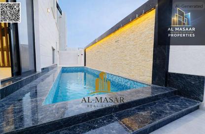 Villa - 5 Bedrooms - 7 Bathrooms for sale in Ajman Hills - Al Alia - Ajman