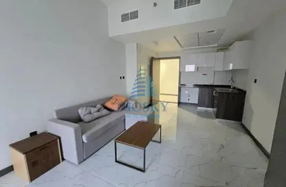 شقة - غرفة نوم - 1 حمام للايجار في برج روكان B - برج روكان - روكان - دبي لاند - دبي