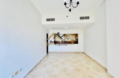 Apartment - 1 - 2 for rent in Al Thuraya Building - Dubai Silicon Oasis - Dubai