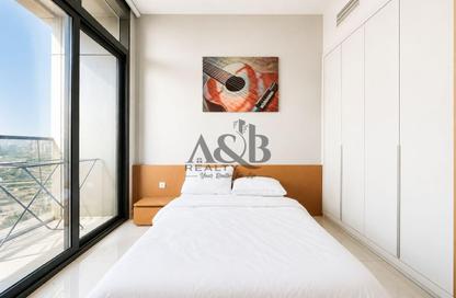 Apartment - Studio - 1 for rent in Blue Waves Tower - Dubai Land Residence Complex - Dubai