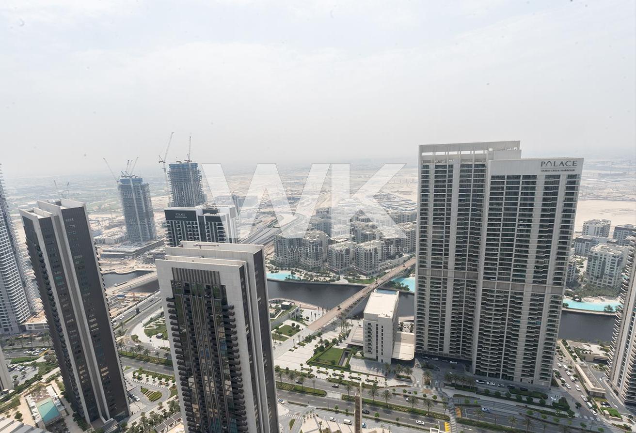 High Floor / Burj and Creek View / 4BR Furnished photo 11
