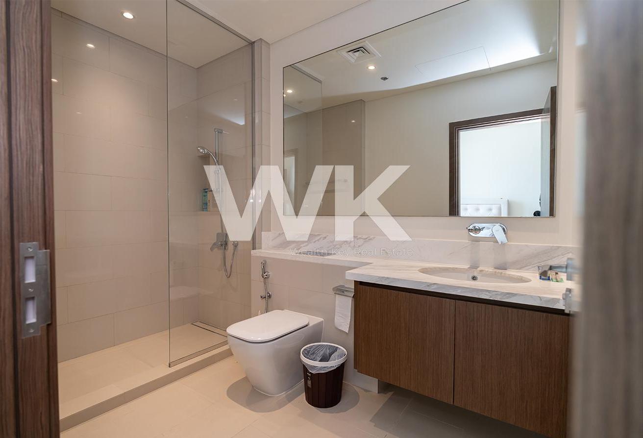 High Floor / Burj and Creek View / 4BR Furnished photo 16