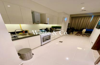 Apartment - Studio - 1 for rent in Golf Promenade 2A - Golf Promenade 2 - Golf Town - Damac Hills - Dubai