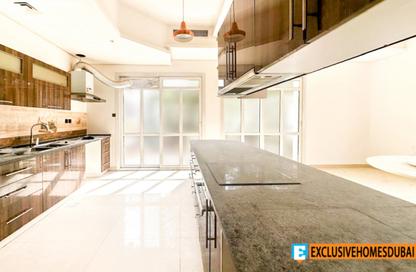 Villa - 5 Bedrooms - 6 Bathrooms for sale in The Centro - The Villa - Dubai