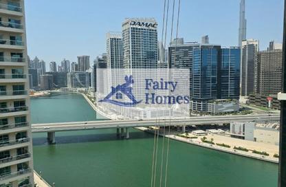 Apartment - 1 - 1 for rent in Mayfair Tower - Business Bay - Dubai