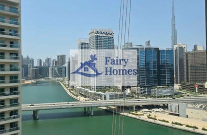 Apartment - 1 - 1 for rent in Mayfair Tower - Business Bay - Dubai
