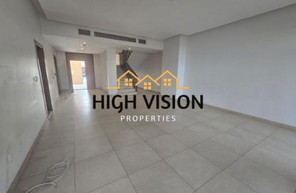 Townhouse - 4 - 5 for rent in Golf Gardens - Khalifa City - Abu Dhabi