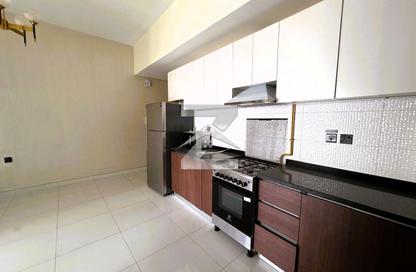 Apartment - 1 - 1 for rent in Wavez Residence - Liwan - Dubai