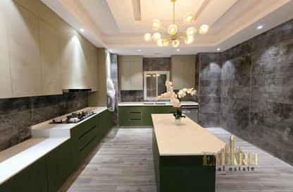 Villa - 5 Bedrooms - 7 Bathrooms for sale in Al Zaheya Gardens - Al Zahya - Ajman
