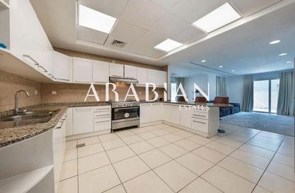 Bungalow - 4 - 5 for rent in Bungalow Area - Green Community Motor City - Motor City - Dubai