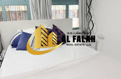 Apartment - Studio - 1 Bathroom for rent in Al Shahid Tower - Al Qasba - Sharjah