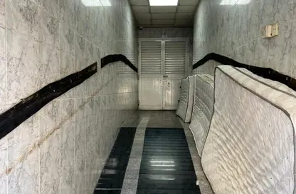 عمارة بالكامل للايجار في شارع زايد بن اسلم - أبو شغارة - الشارقة