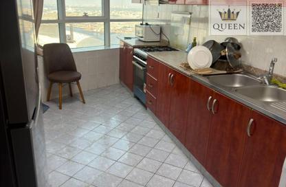 Apartment - 1 - 2 for sale in Orient Towers - Al Bustan - Ajman
