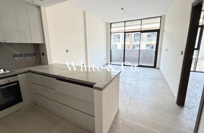 Apartment - 1 - 2 for sale in Helvetia Residences - District 14 - Jumeirah Village Circle - Dubai
