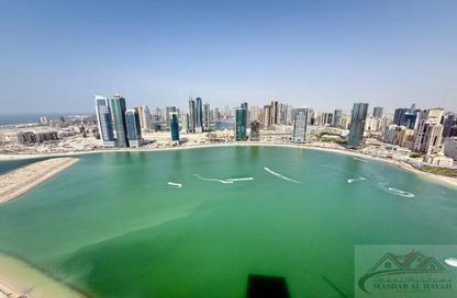 Apartment - 3 - 4 for rent in La Plage Tower - Al Mamzar - Sharjah - Sharjah