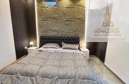 Apartment - 1 - 2 for sale in Tower A2 - Ajman Pearl Towers - Ajman Downtown - Ajman