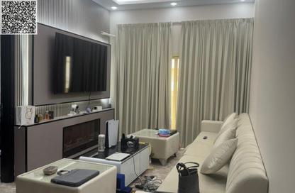 Apartment - 1 - 2 for sale in Lilies Tower - Emirates City - Ajman Apartment - 1 - 2 for sale in Lilies Tower - Emirates City - Ajman