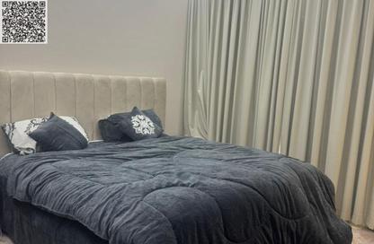 Apartment - 1 - 2 for sale in Lilies Tower - Emirates City - Ajman Apartment - 1 - 2 for sale in Lilies Tower - Emirates City - Ajman