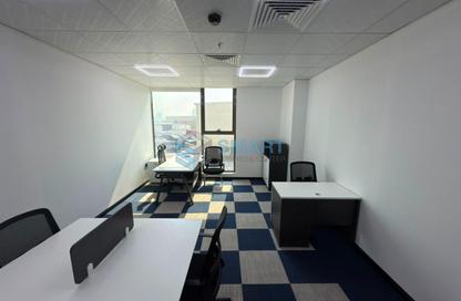 Business Centre - Studio - 4 Bathrooms for rent in Ramool New Building 2 - Umm Ramool - Dubai