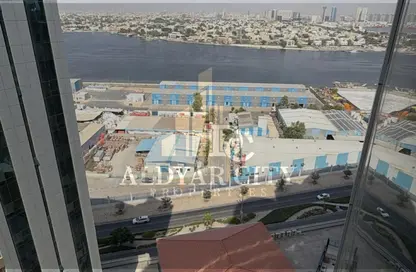 شقة - غرفة نوم - 2 حمامات للايجار في أورينت تاور 1 - أورينت تاور - البستان - عجمان