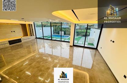Villa - 4 - 6 for sale in Golf Community - Al Zorah - Ajman Villa - 4 - 6 for sale in Golf Community - Al Zorah - Ajman