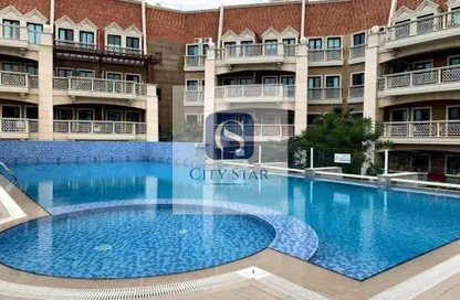 Apartment - 1 Bedroom - 2 Bathrooms for sale in Le Grand Chateau A - Le Grand Chateau - District 10 - Jumeirah Village Circle - Dubai