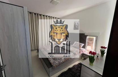 Apartment - 1 - 2 for rent in Corniche Tower - Ajman Corniche Road - Ajman