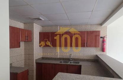 Apartment - 1 Bedroom - 2 Bathrooms for rent in Building IC1-EMR-26 - Emirates Cluster - International City - Dubai