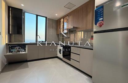 Apartment - 1 - 2 for sale in Tulip Oasis 10 - Majan - Dubai