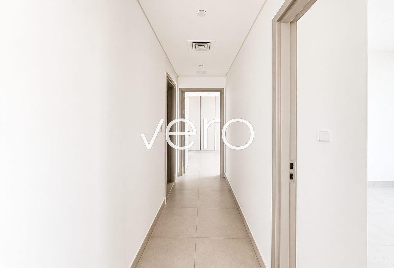 Full Canal & Lagoon View | Corner Unit | Vacant photo 12