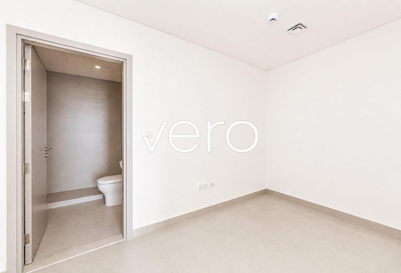 Full Canal & Lagoon View | Corner Unit | Vacant photo 18