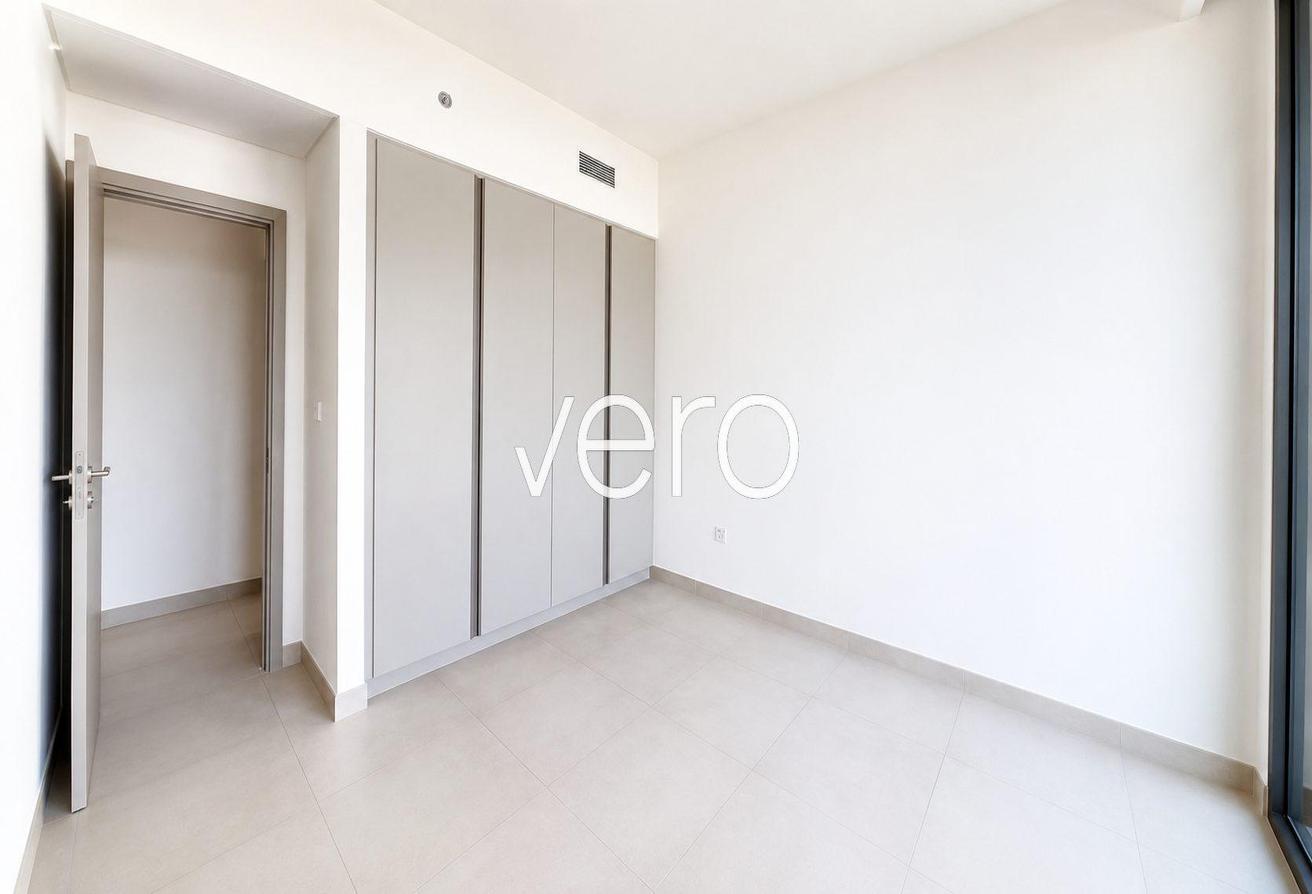 Full Canal & Lagoon View | Corner Unit | Vacant photo 15