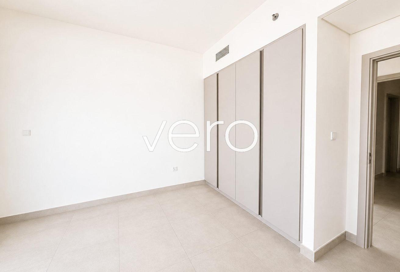 Full Canal & Lagoon View | Corner Unit | Vacant photo 16
