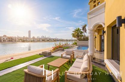 Villa - 4 - 5 for rent in Garden Homes Frond E - Garden Homes - Palm Jumeirah - Dubai