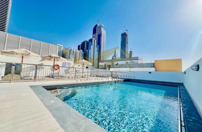Apartment - 1 Bedroom - 2 Bathrooms for rent in Jumeirah Garden City - Al Satwa - Dubai