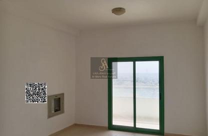 Apartment - 1 Bedroom - 2 Bathrooms for sale in Smart Tower 1 - Al Amerah - Ajman