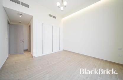 Townhouse - 4 - 4 for sale in Sevilla Village - Victory Heights - Dubai Sports City - Dubai