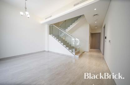 Townhouse - 4 - 4 for sale in Sevilla Village - Victory Heights - Dubai Sports City - Dubai