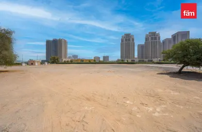 Land - Studio for sale in Queue Point - Liwan - Dubai