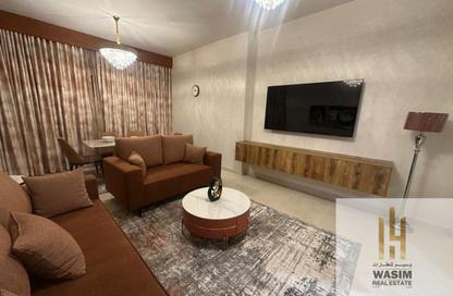 Apartment - 1 Bedroom - 2 Bathrooms for sale in Orient Tower 1 - Orient Towers - Al Bustan - Ajman