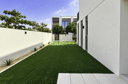 Townhouse - 4 - 4 for rent in Aura Gardens - Tilal Al Ghaf - Dubai