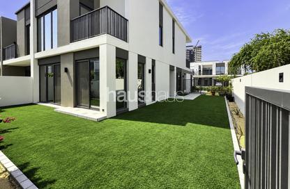 Townhouse - 4 - 4 for rent in Aura Gardens - Tilal Al Ghaf - Dubai