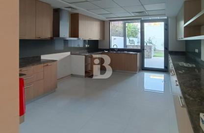 Townhouse - 3 - 3 for sale in Gardenia Townhomes - Wasl Gate - Dubai